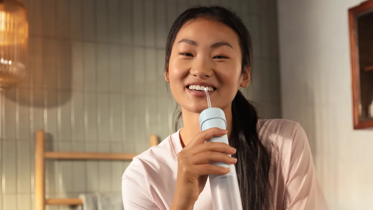Ирригатор Philips Sonicare Compact Flosser 1000 HX3333/24 голубой — фото 4