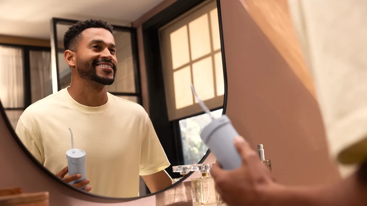 Ирригатор Philips Sonicare Compact Flosser 1000 HX3333/24 голубой — фото 7
